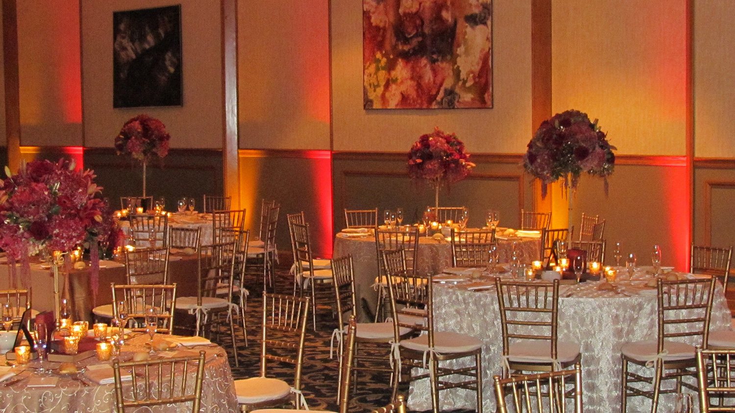 Freehof Hall event space set for a formal reception, featuring elegantly decorated banquet tables, floral centerpieces, and ambient lighting.